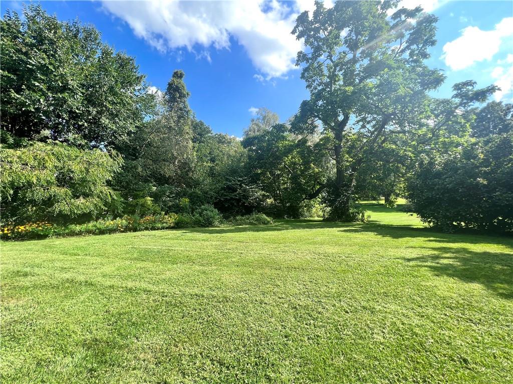3738 Ellwood Road New Castle, PA 16101 - Photo 24 of 27 a view of a field with a trees in the background