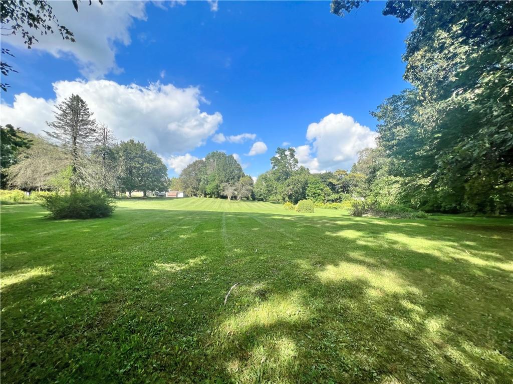 3738 Ellwood Road New Castle, PA 16101 - Photo 26 of 27 a view of a golf course with a lake
