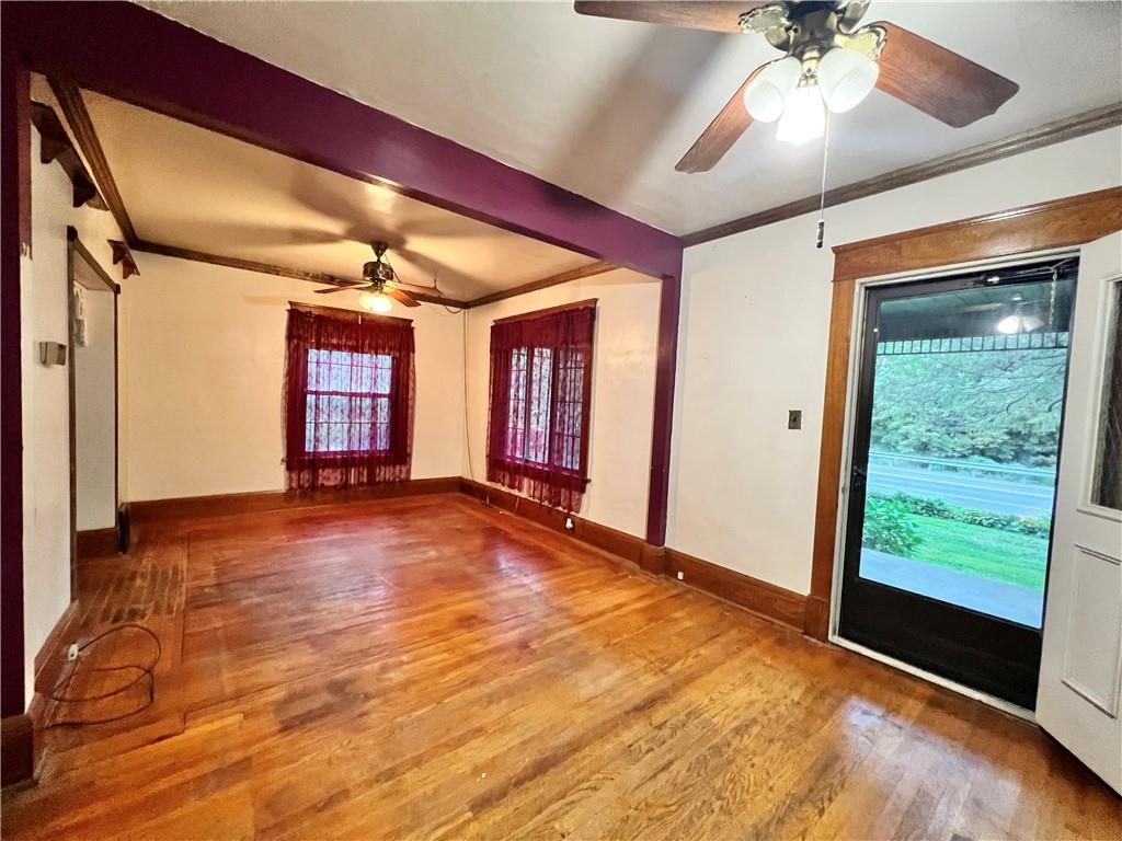 3738 Ellwood Road New Castle, PA 16101 - Photo 7 of 27 a view of an empty room and window