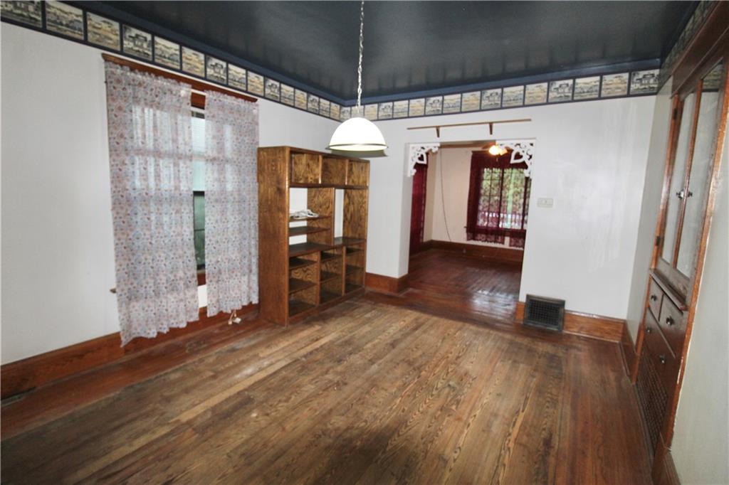 3738 Ellwood Road New Castle, PA 16101 - Photo 9 of 27 a view of a room with wooden floor