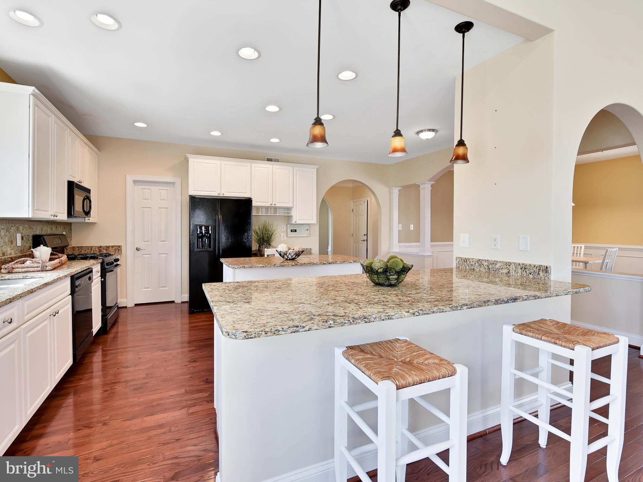 3931 Addison Woods Road Frederick, MD 21704 - Photo 14 of 65 Expansive counter-space with granite countertops.
