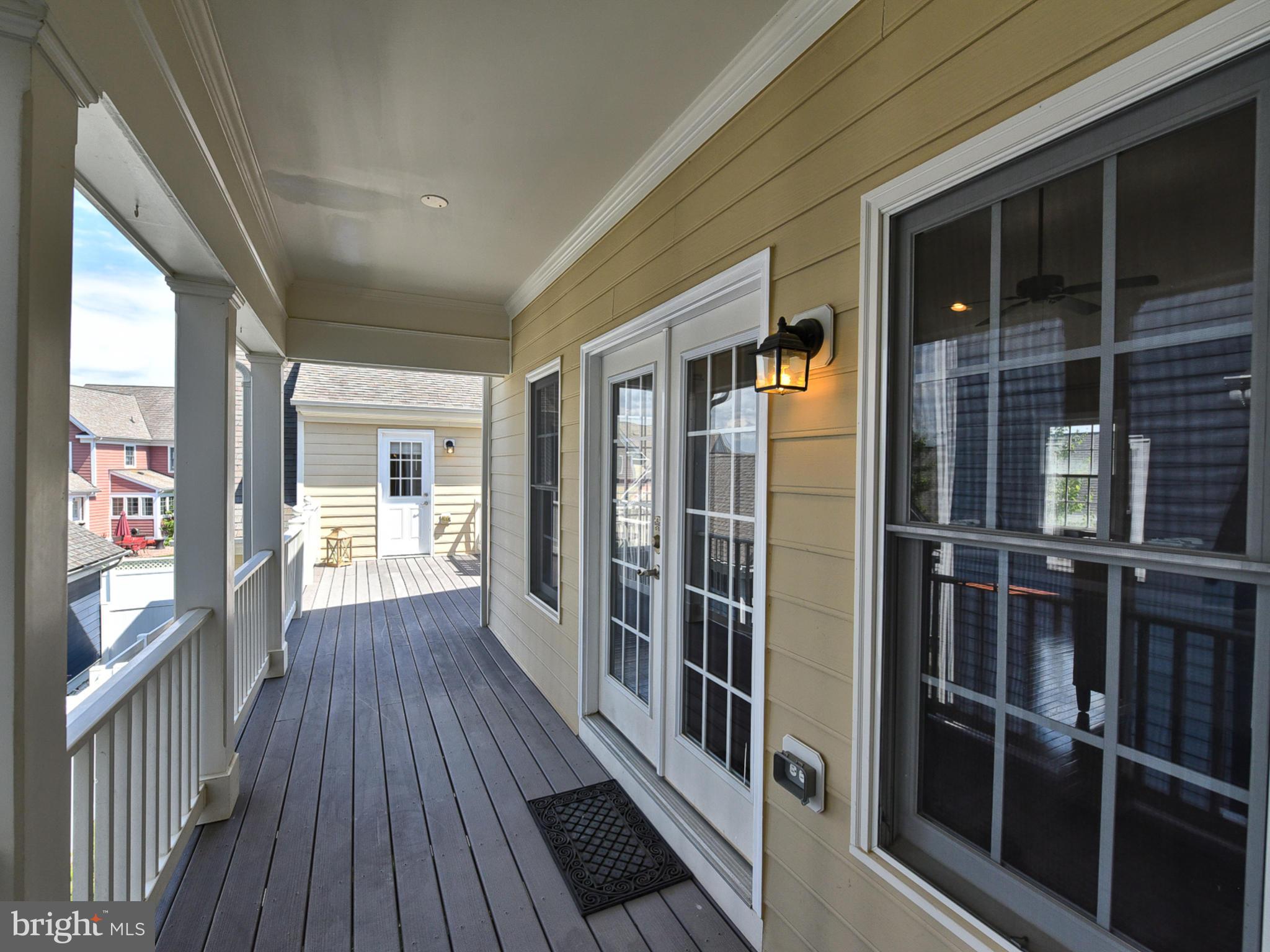3931 Addison Woods Road Frederick, MD 21704 - Photo 38 of 65 Covered deck connects to seating area & apartment.