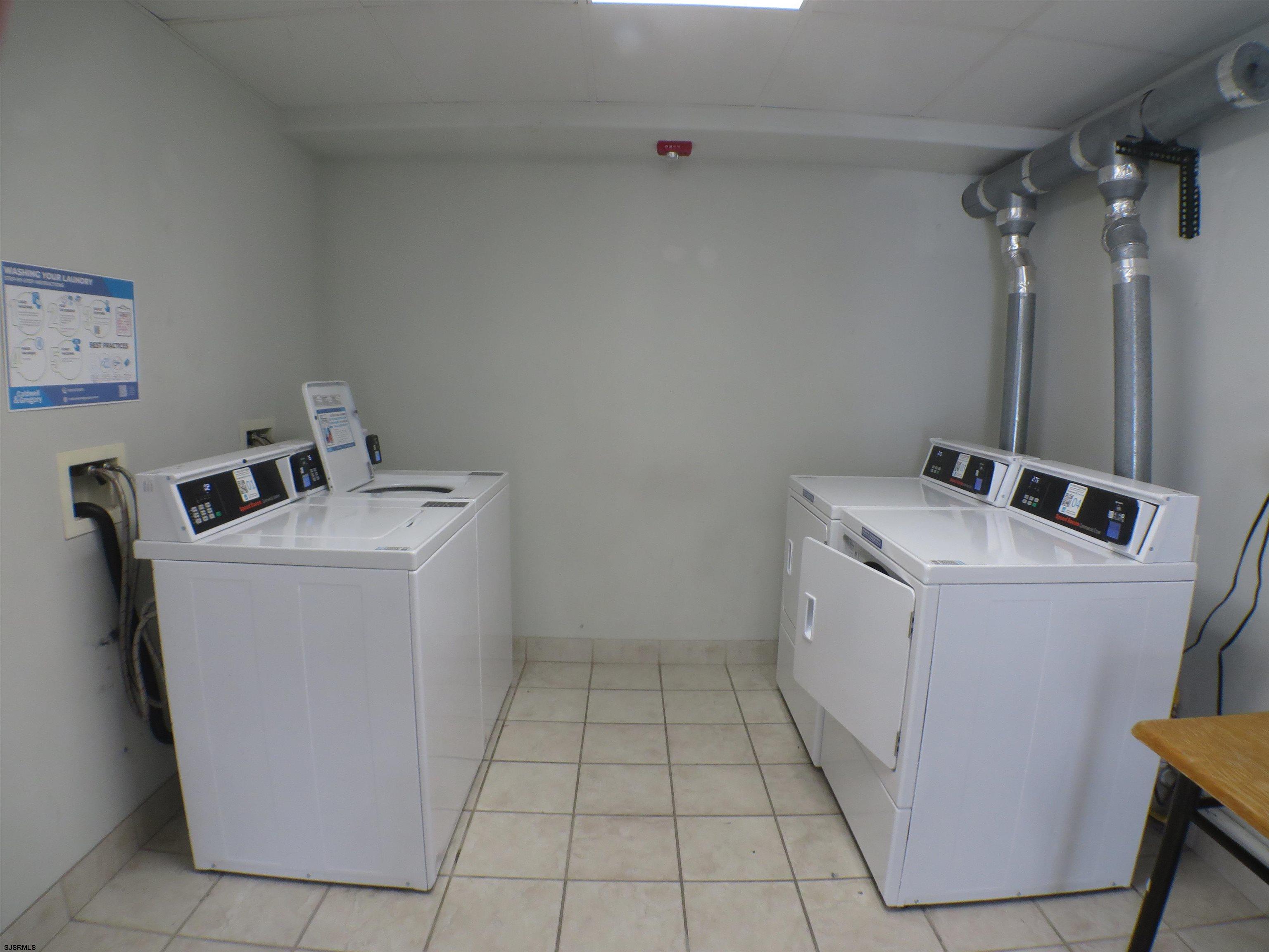 900 Wesley Avenue, Unit 103 Ocean City, NJ 08226 - Photo 15 of 15 a utility room with dryer and washer