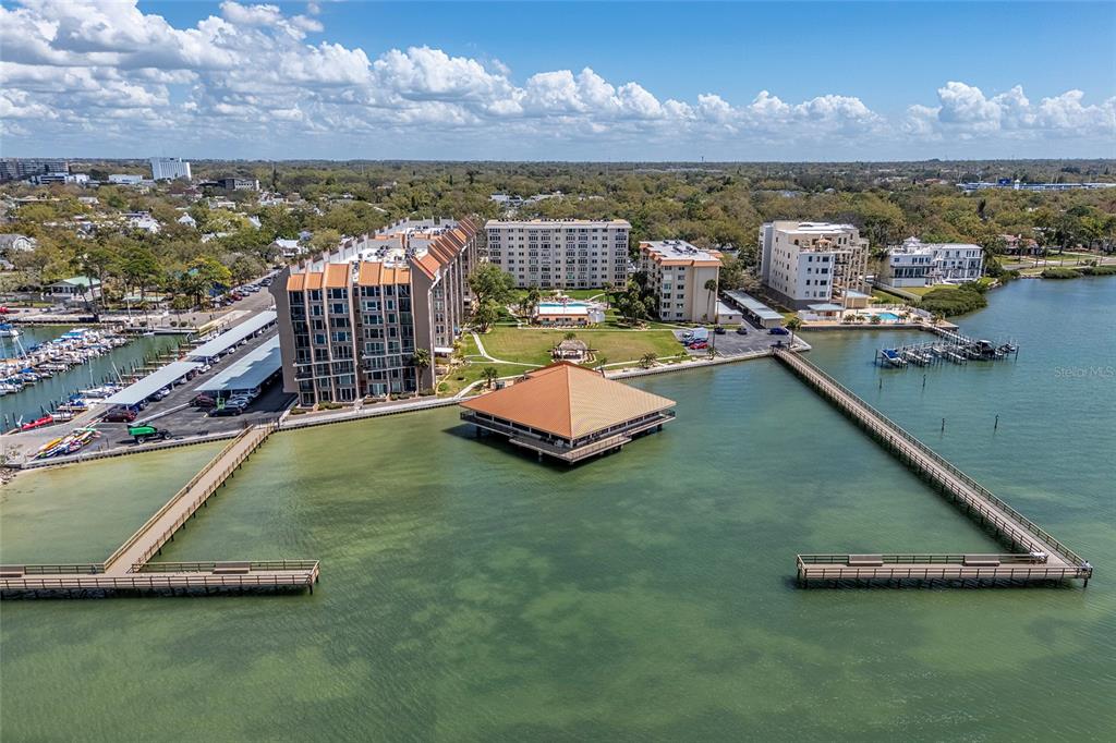 620 Edgewater Drive, Unit 103 Dunedin, FL 34698 - Photo 2 of 26 an aerial view of a house with a ocean view