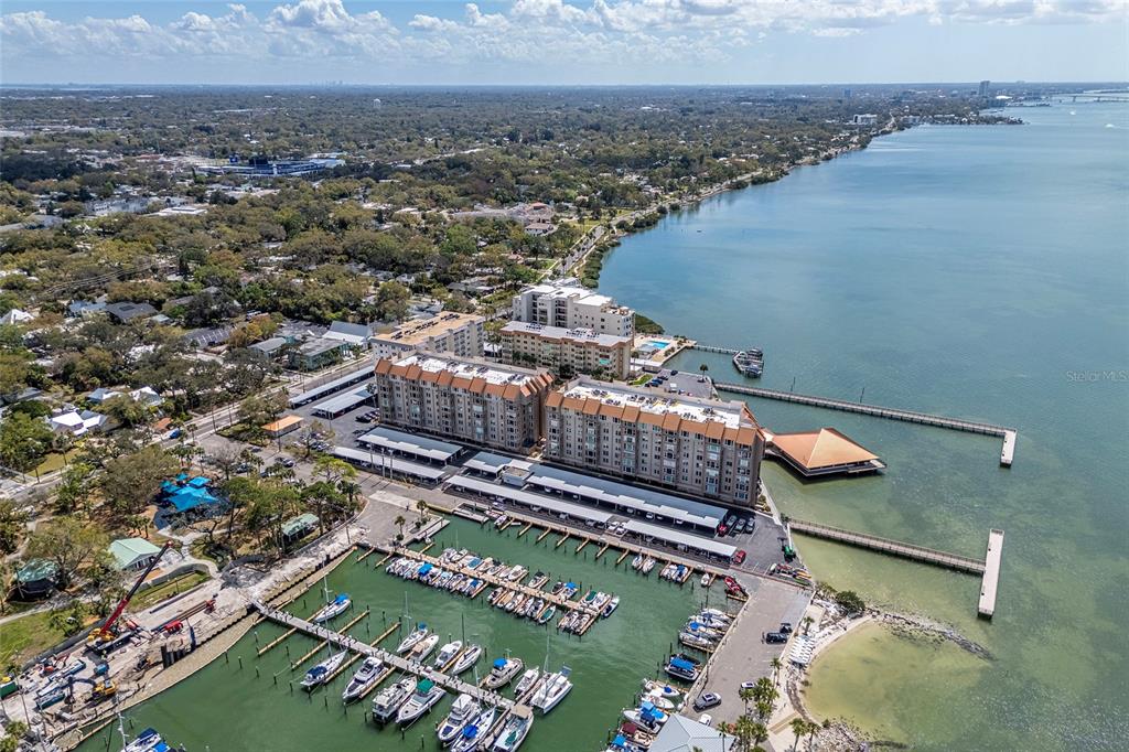 620 Edgewater Drive, Unit 103 Dunedin, FL 34698 - Photo 22 of 26 an aerial view of a residential houses with outdoor space
