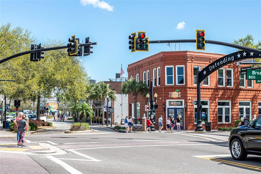 620 Edgewater Drive, Unit 103 Dunedin, FL 34698 - Photo 25 of 26 a view of a building and a street