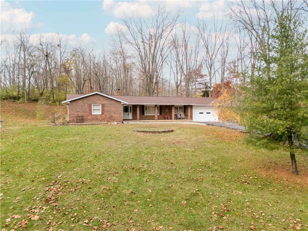 18333 Lefevre Number 2 Road Sidney, OH 45365 - Photo 5 of 25 This charming home offers comfortable living with a spacious yard and inviting curb appeal.