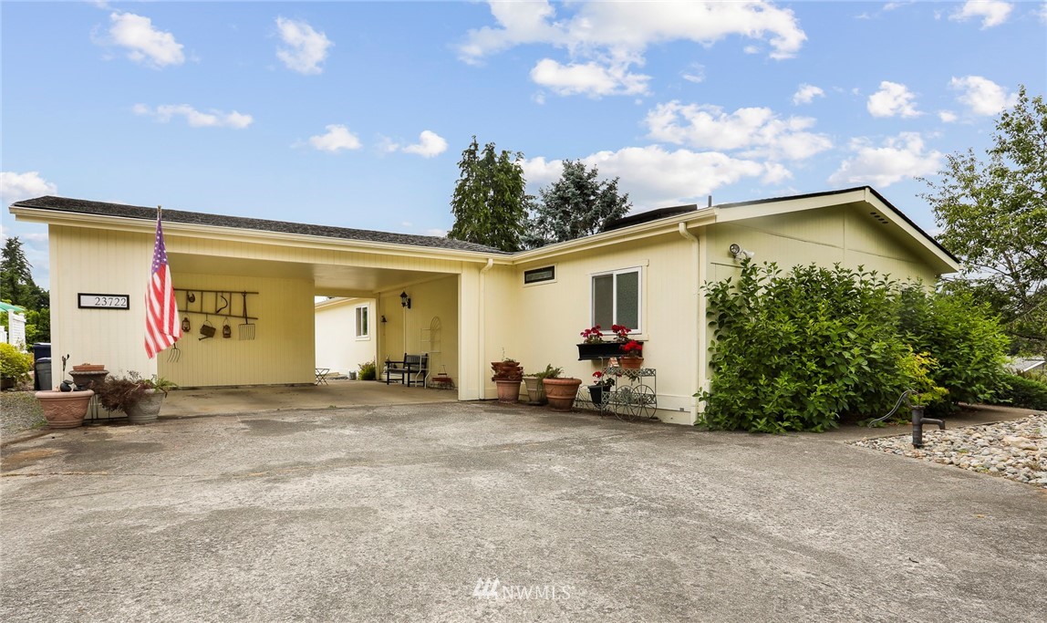 23722 9th Place West Bothell, WA 98021 - Photo 1 of 1 a view of a house with a patio