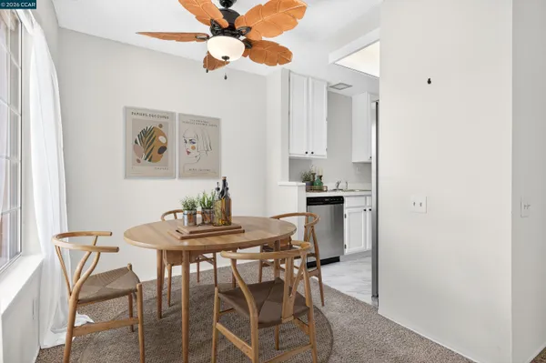a view of a dining room with furniture