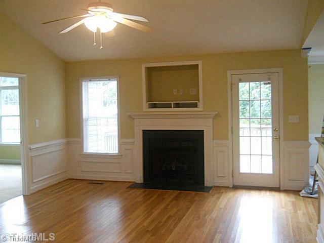 8093 Pritchett Road Browns Summit, NC 27214 - Photo 8 of 16 Living Room. view of LR from foyer and gas log fireplace