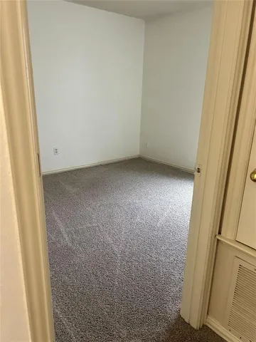 a bathroom with a tub and a sink