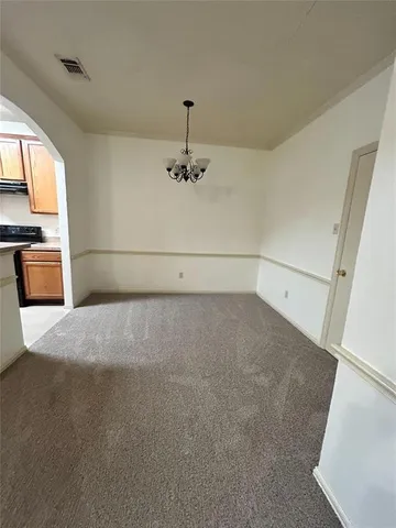 a view of a kitchen with a sink dishwasher and a microwave oven