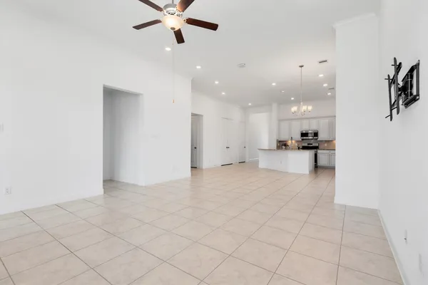 a view of a kitchen with a sink and a window