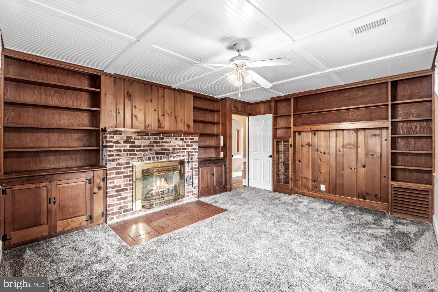 149 Rectory Road Montross, VA 22520 - Photo 21 of 42 a view of a kitchen with furniture and a fireplace