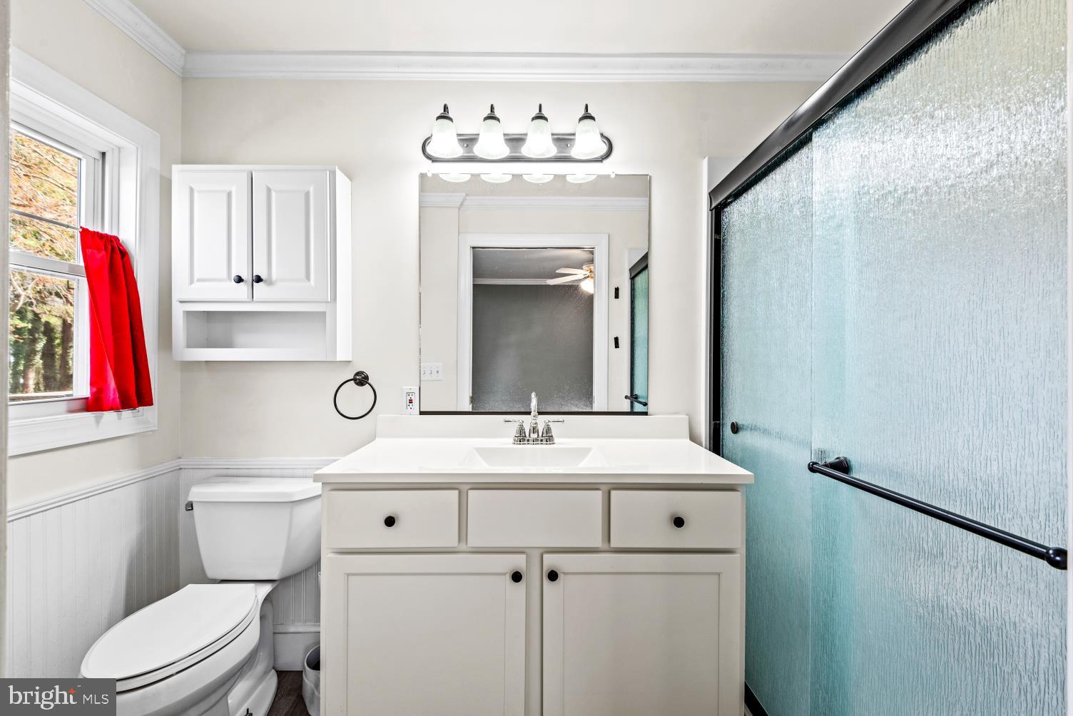 149 Rectory Road Montross, VA 22520 - Photo 25 of 42 a bathroom with a sink vanity mirror and toilet