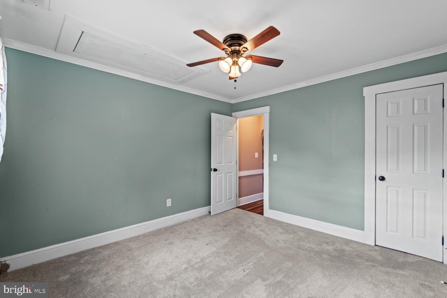 149 Rectory Road Montross, VA 22520 - Photo 29 of 42 an empty room with closet and fan