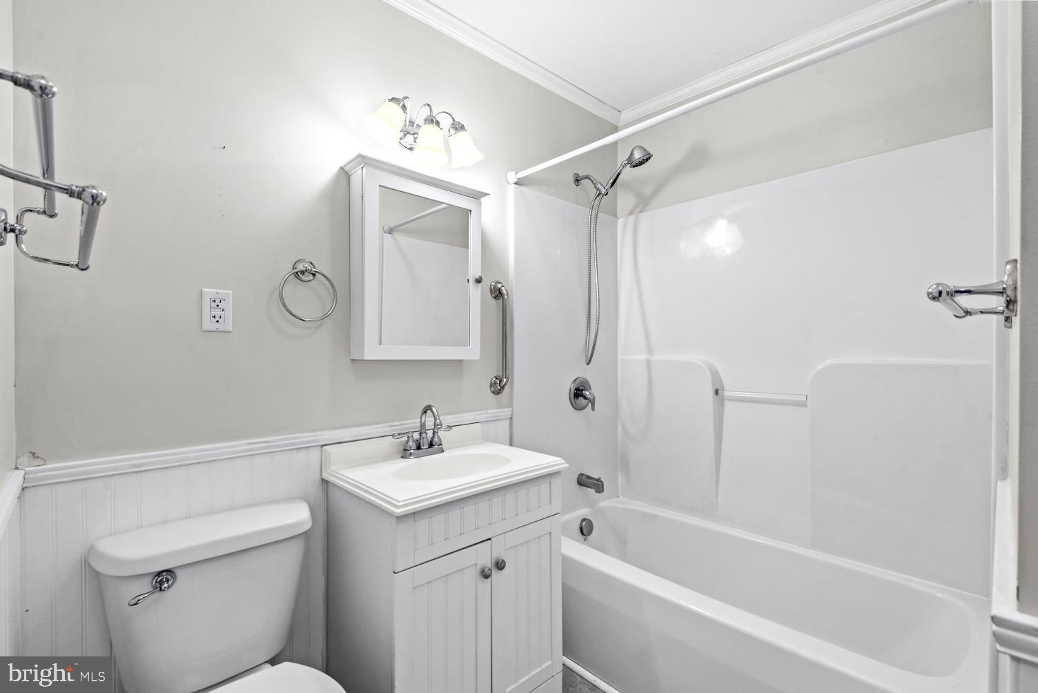 149 Rectory Road Montross, VA 22520 - Photo 30 of 42 a bathroom with a sink mirror toilet and bathtub