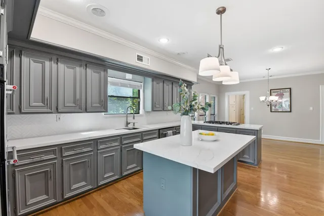 a view of a balcony with wooden floor and fence