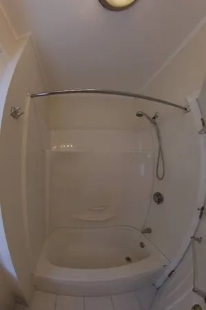 a bathroom with a bath tub