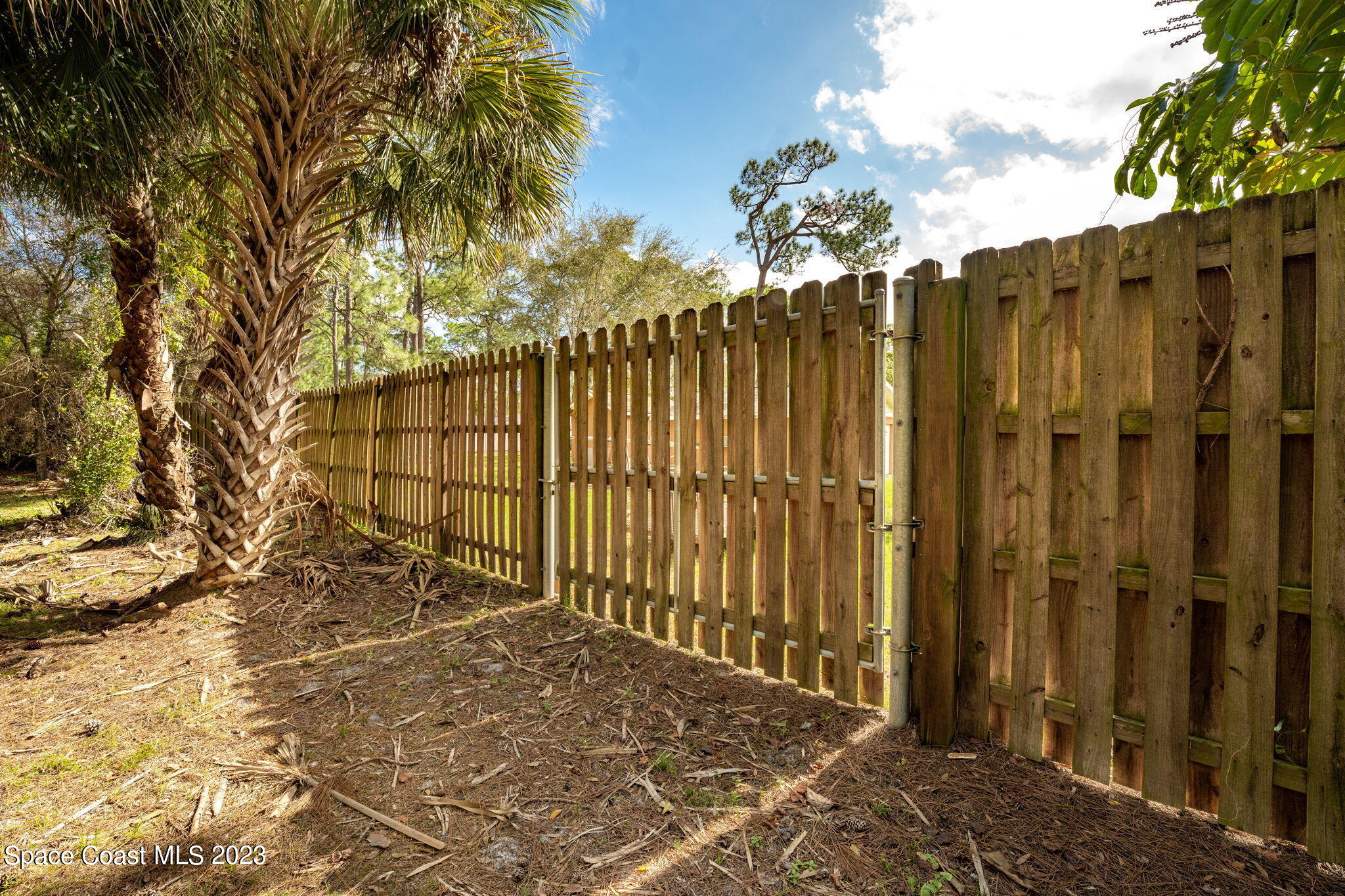 9035 Ellis Road Melbourne, FL 32904 - Photo 10 of 10 a view of a pathway gate