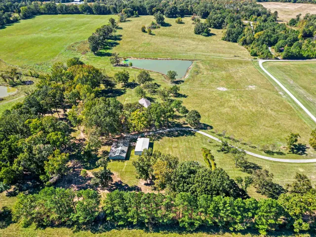 a view of a lake with a yard