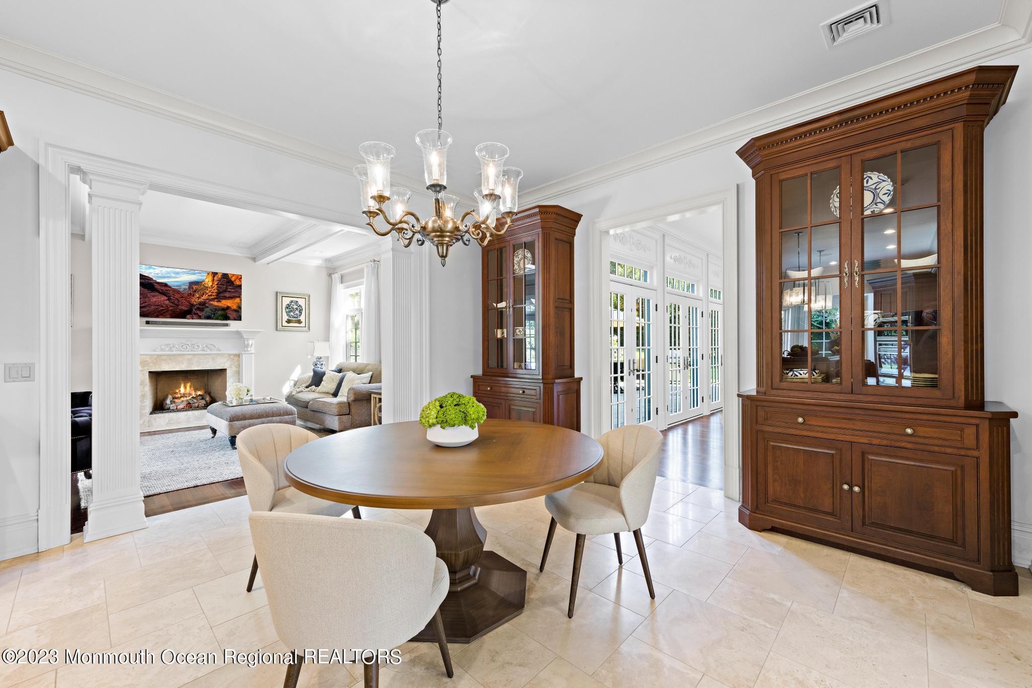 122 Rumson Road Rumson, NJ 07760 - Photo 23 of 100 a view of a dining room with furniture and chandelier