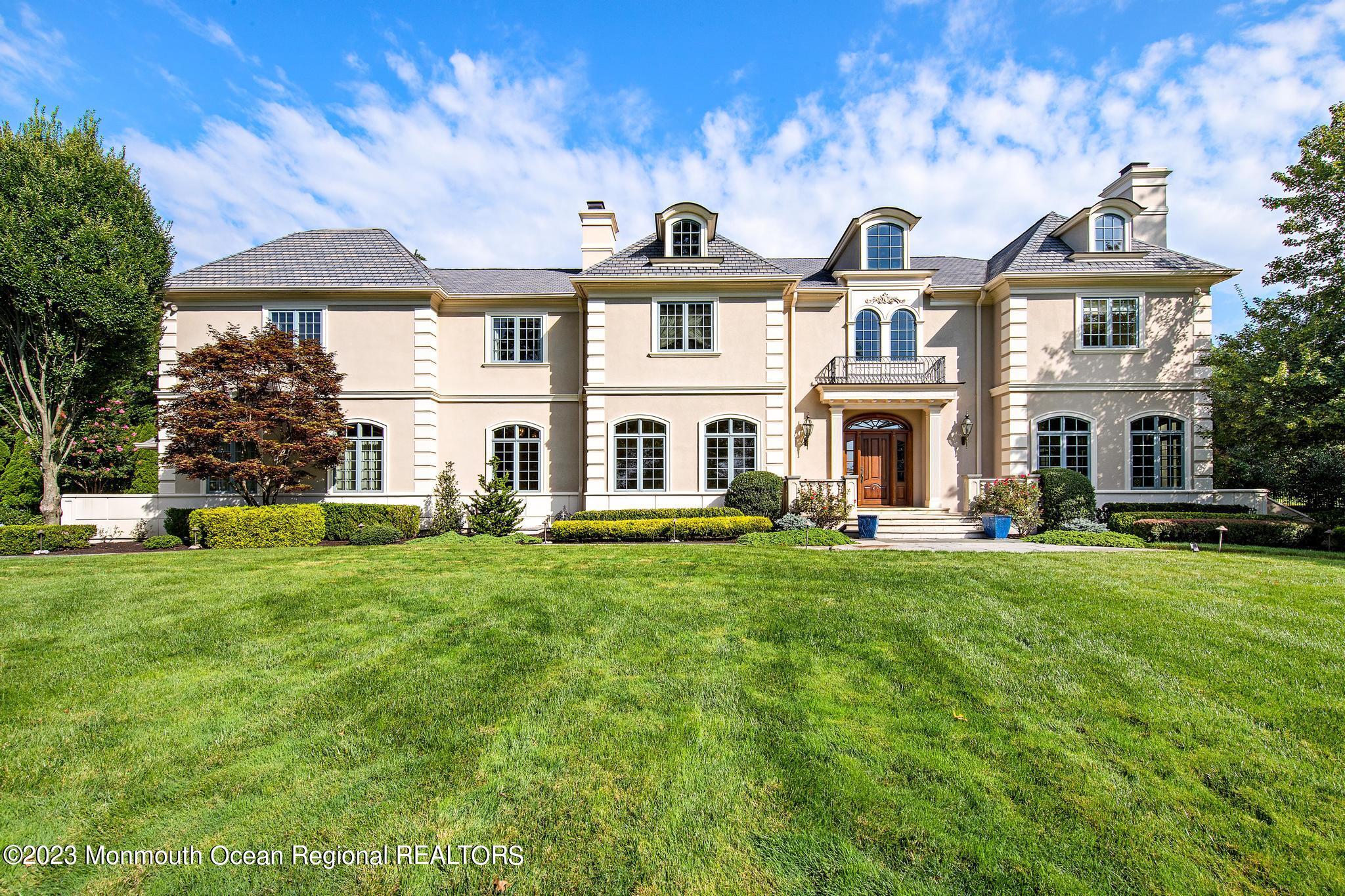 122 Rumson Road Rumson, NJ 07760 - Photo 3 of 100 a front view of a house with a yard