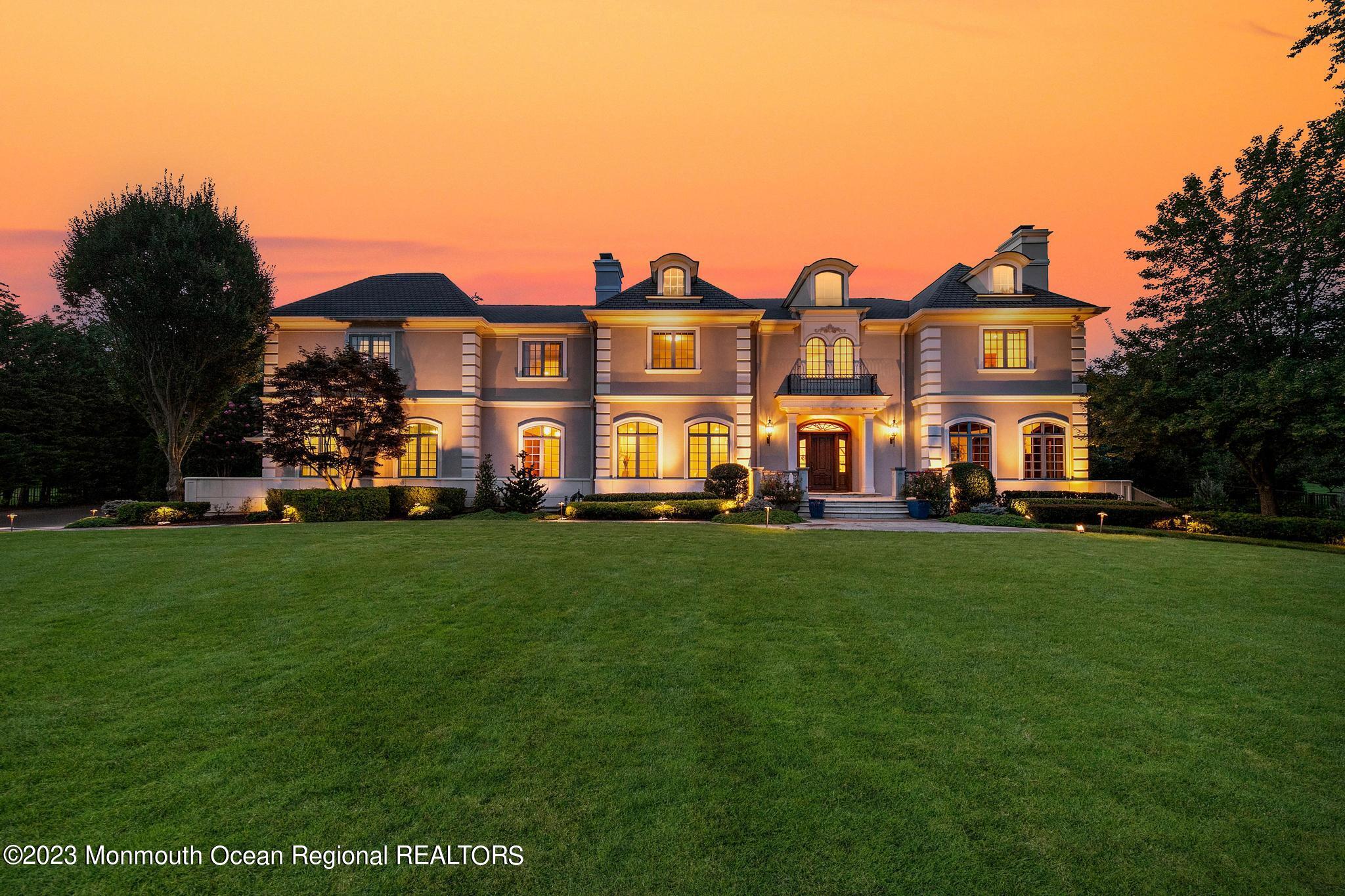122 Rumson Road Rumson, NJ 07760 - Photo 4 of 100 a front view of a house with a yard