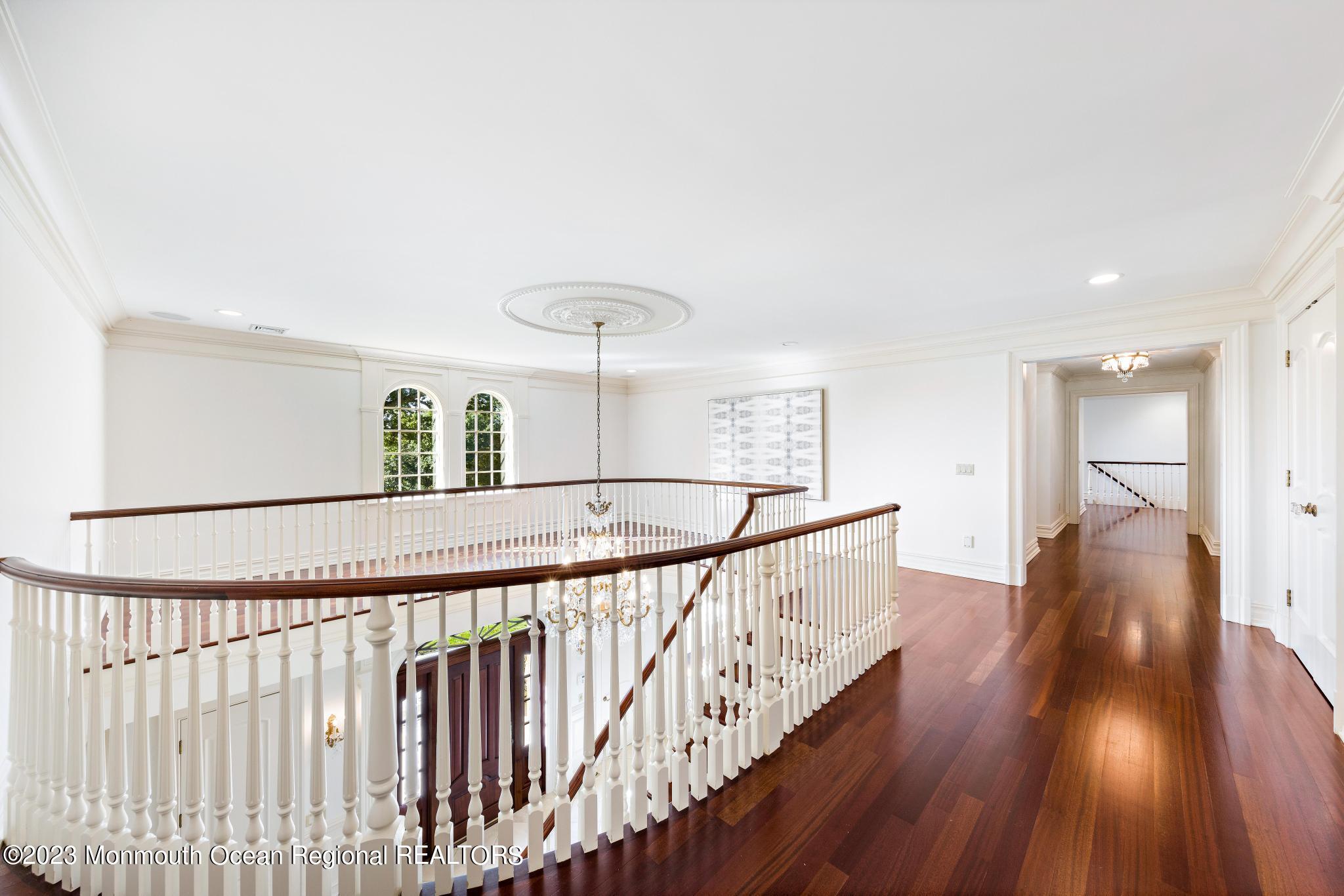 122 Rumson Road Rumson, NJ 07760 - Photo 47 of 100 a view of a hallway with wooden floor