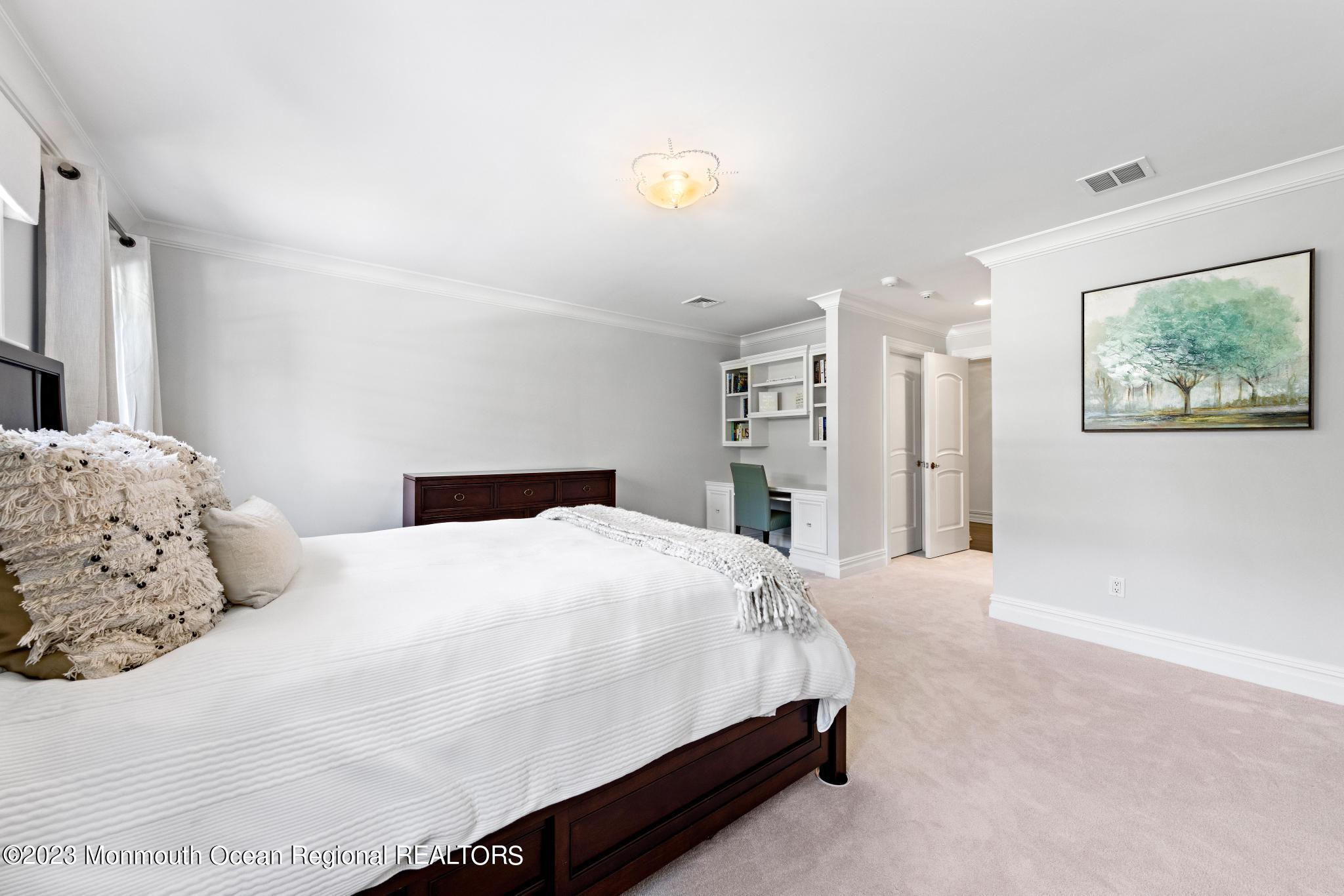 122 Rumson Road Rumson, NJ 07760 - Photo 55 of 100 a bedroom with a bed and a painting on the wall
