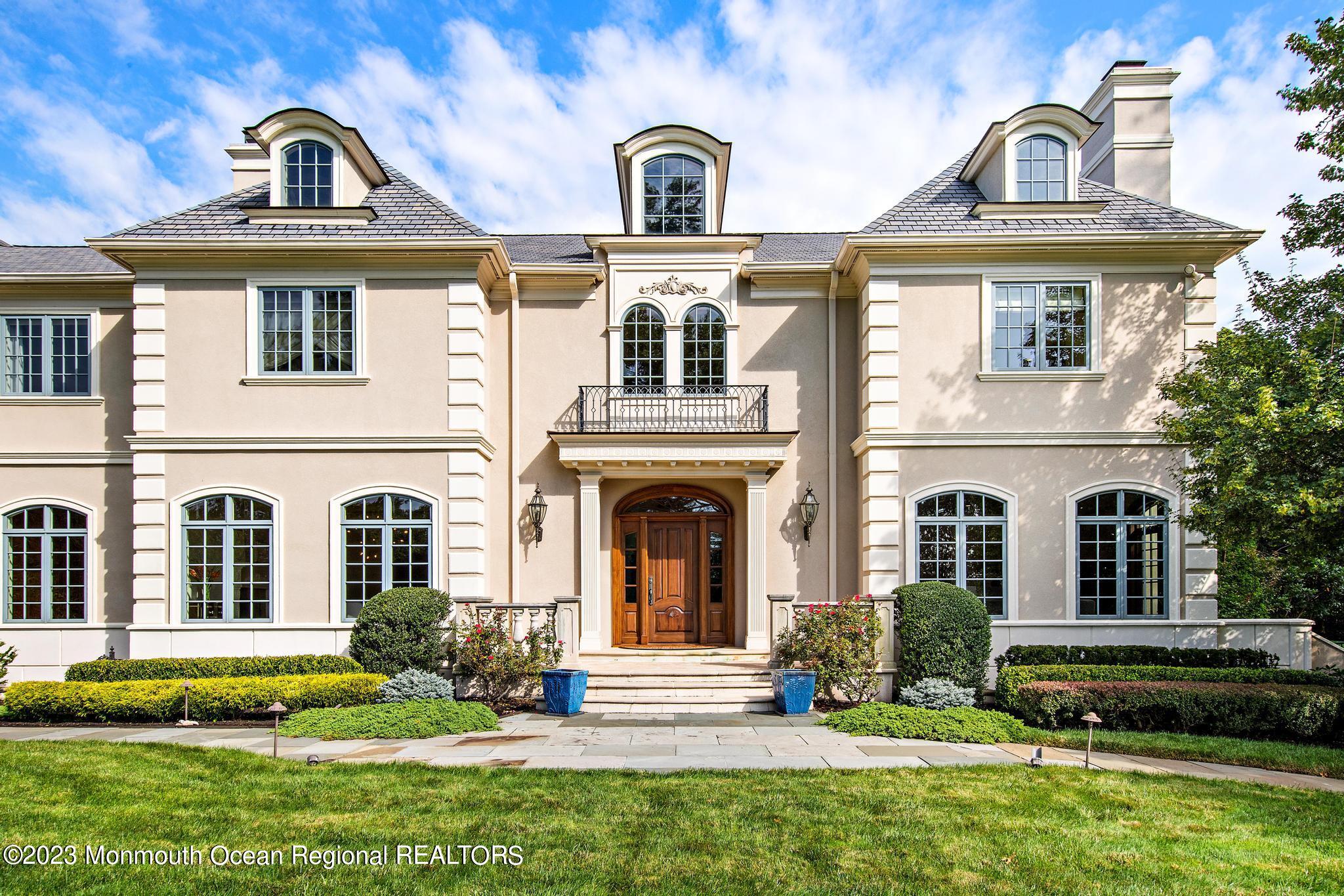122 Rumson Road Rumson, NJ 07760 - Photo 6 of 100 a front view of a house with a yard