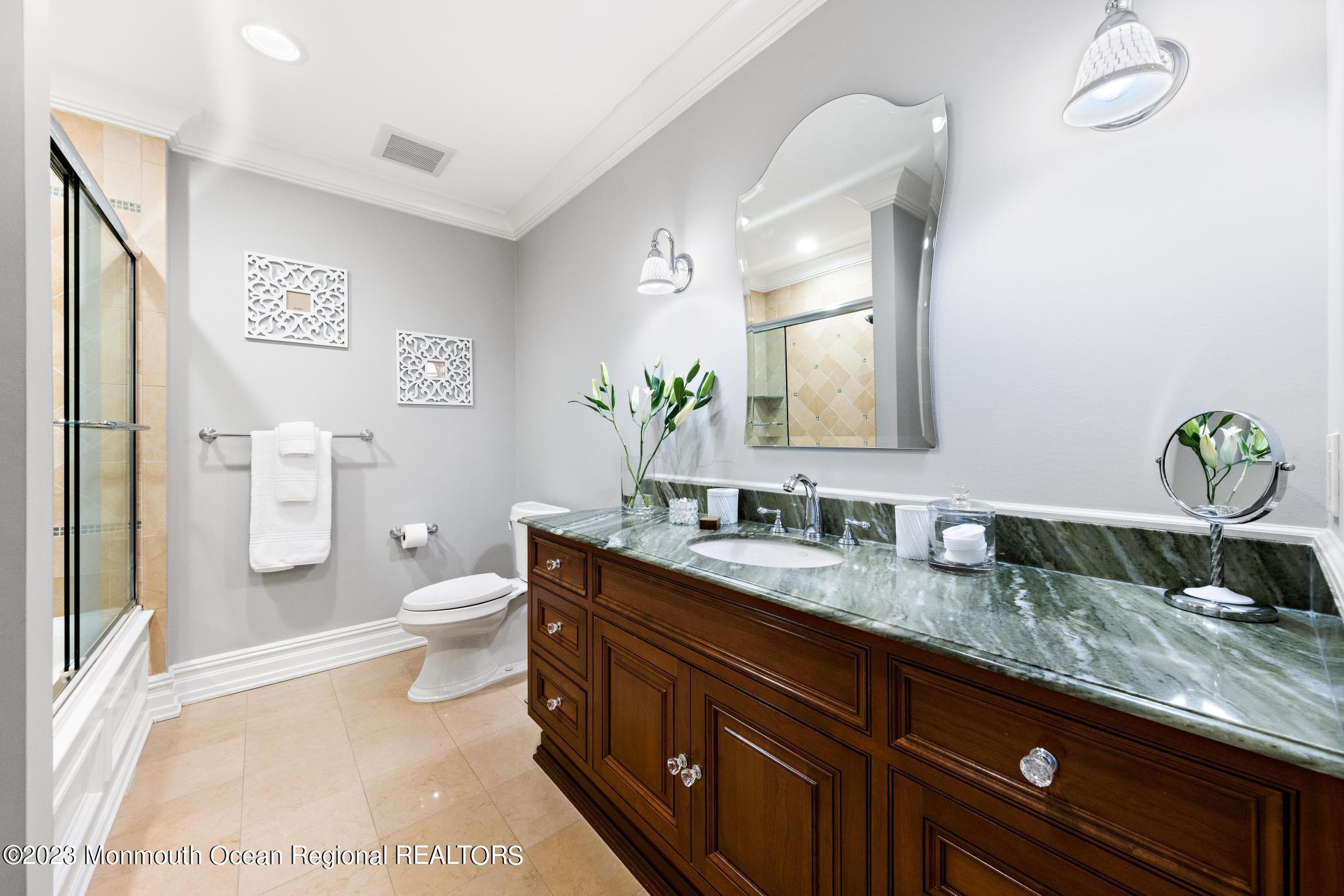 122 Rumson Road Rumson, NJ 07760 - Photo 61 of 100 a bathroom with a granite countertop sink mirror and toilet