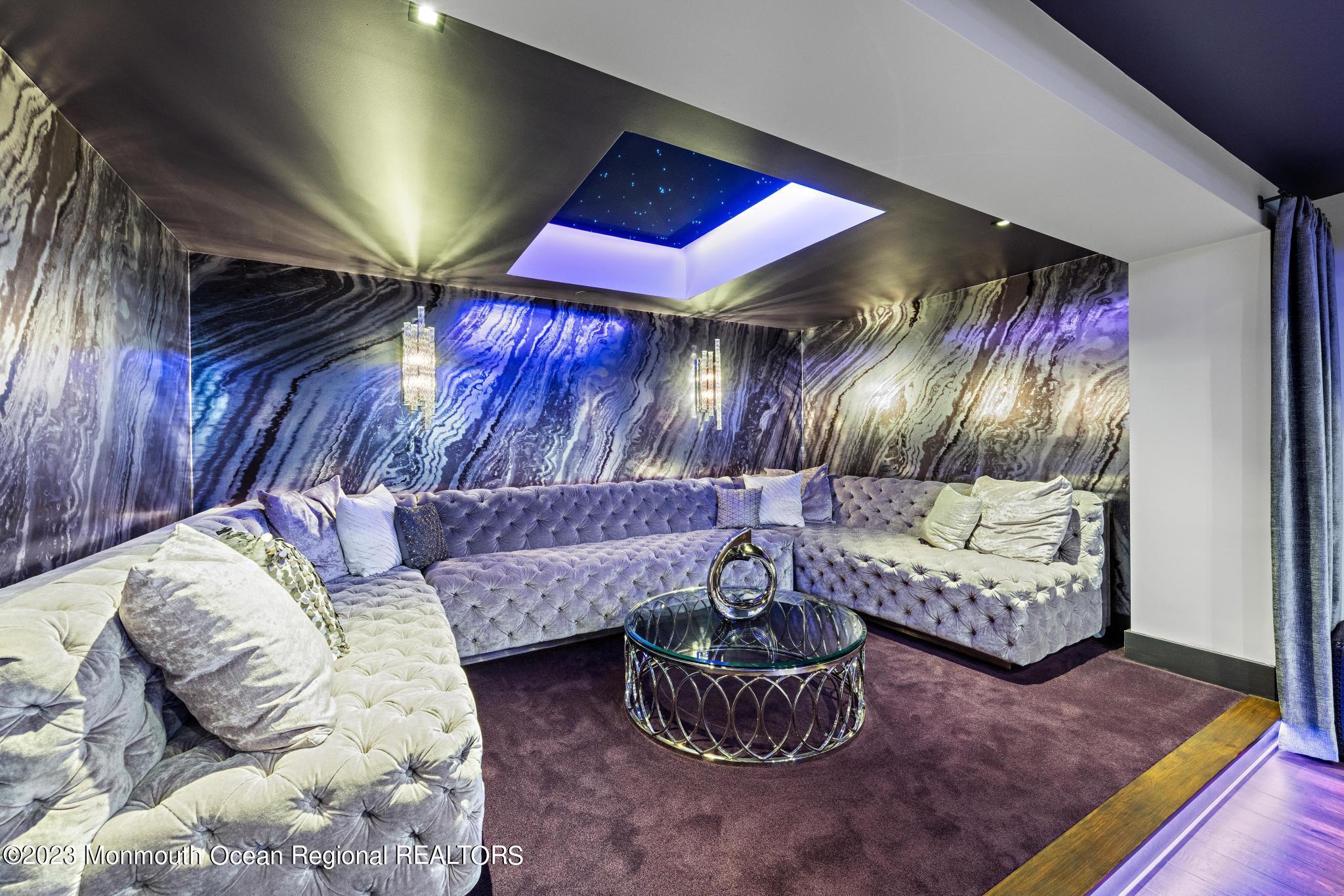 122 Rumson Road Rumson, NJ 07760 - Photo 65 of 100 a living room with furniture and a painting on the wall