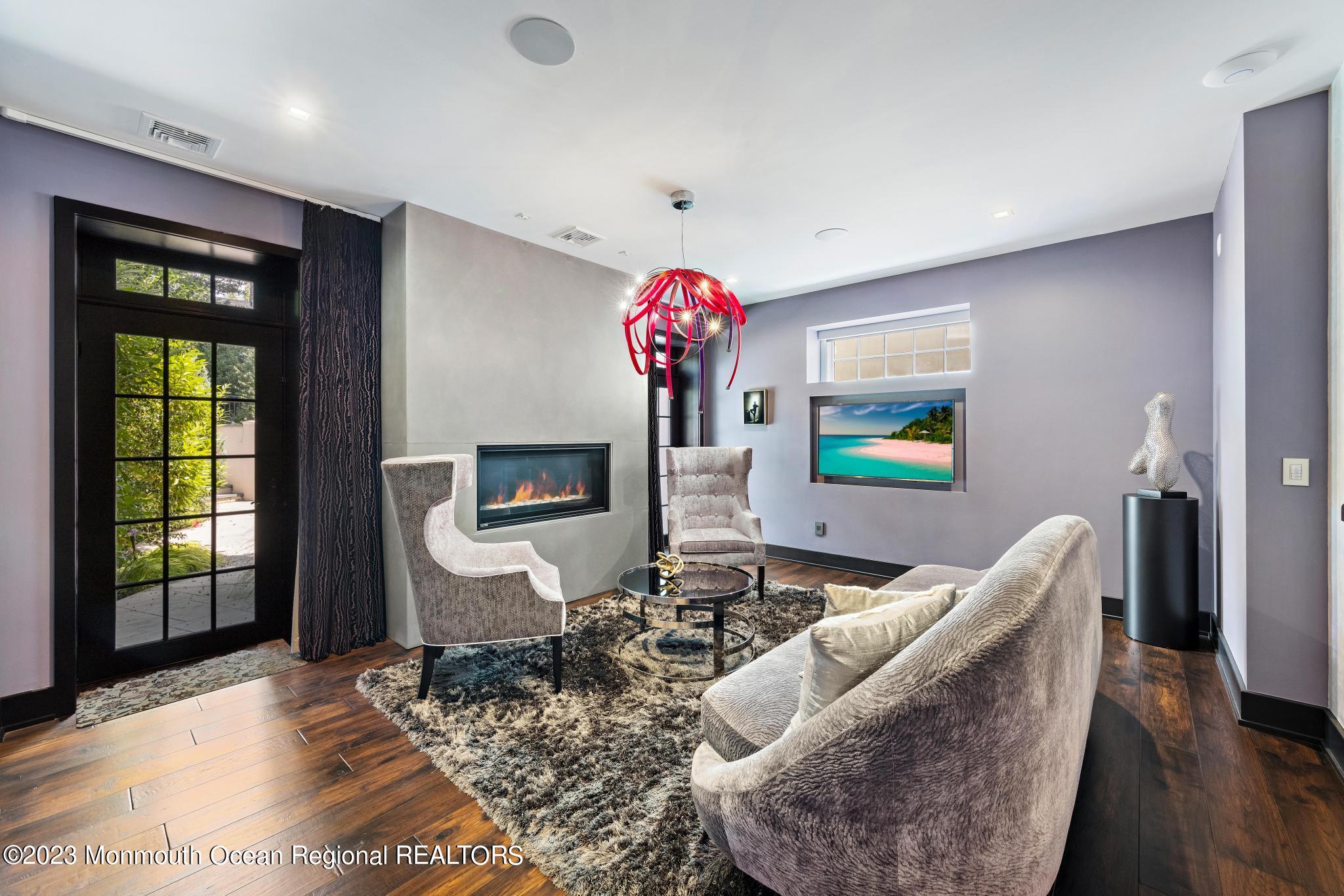 122 Rumson Road Rumson, NJ 07760 - Photo 73 of 100 a living room with furniture and a flat screen tv