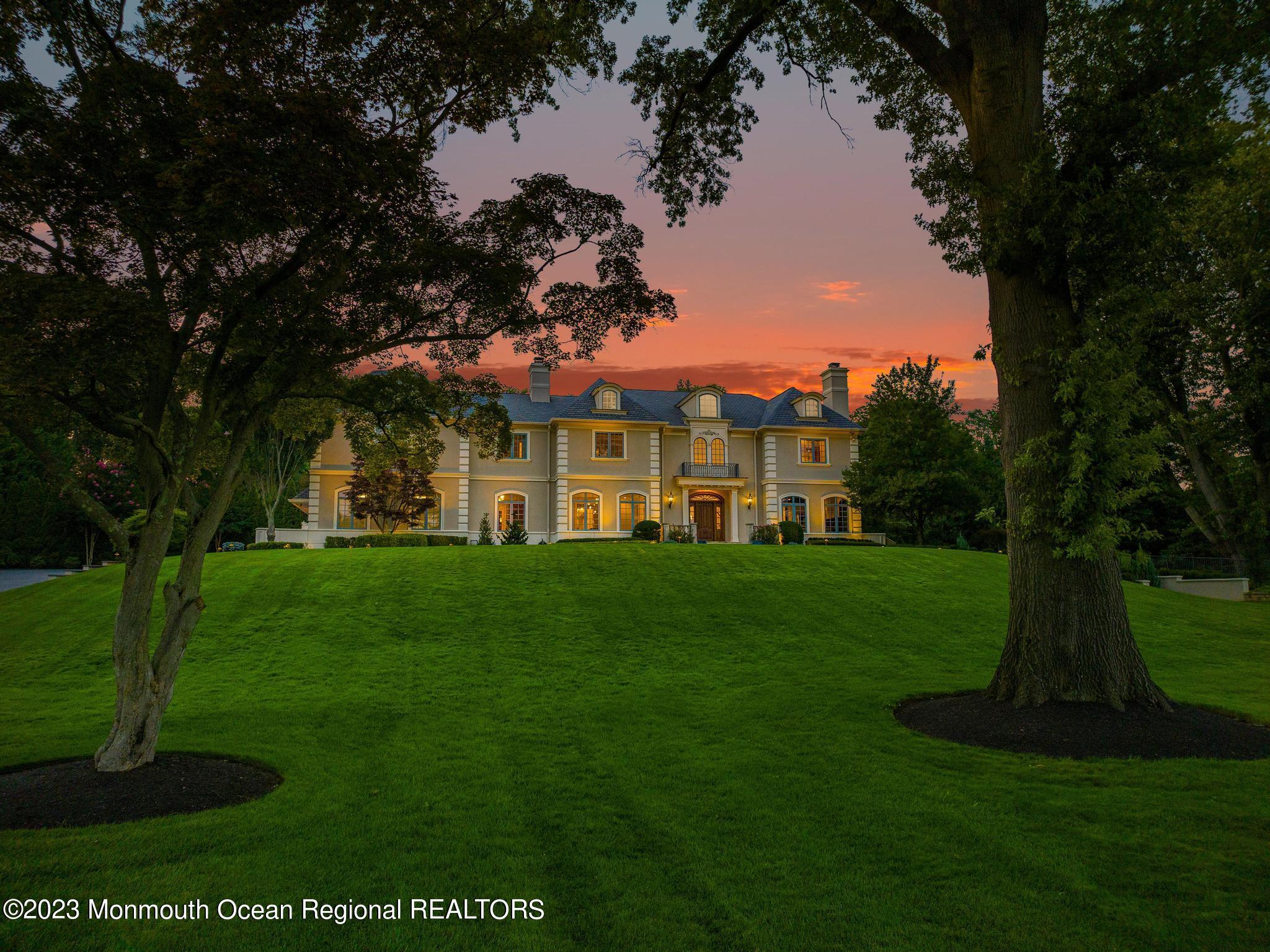 122 Rumson Road Rumson, NJ 07760 - Photo 98 of 100 a front view of a house with a yard