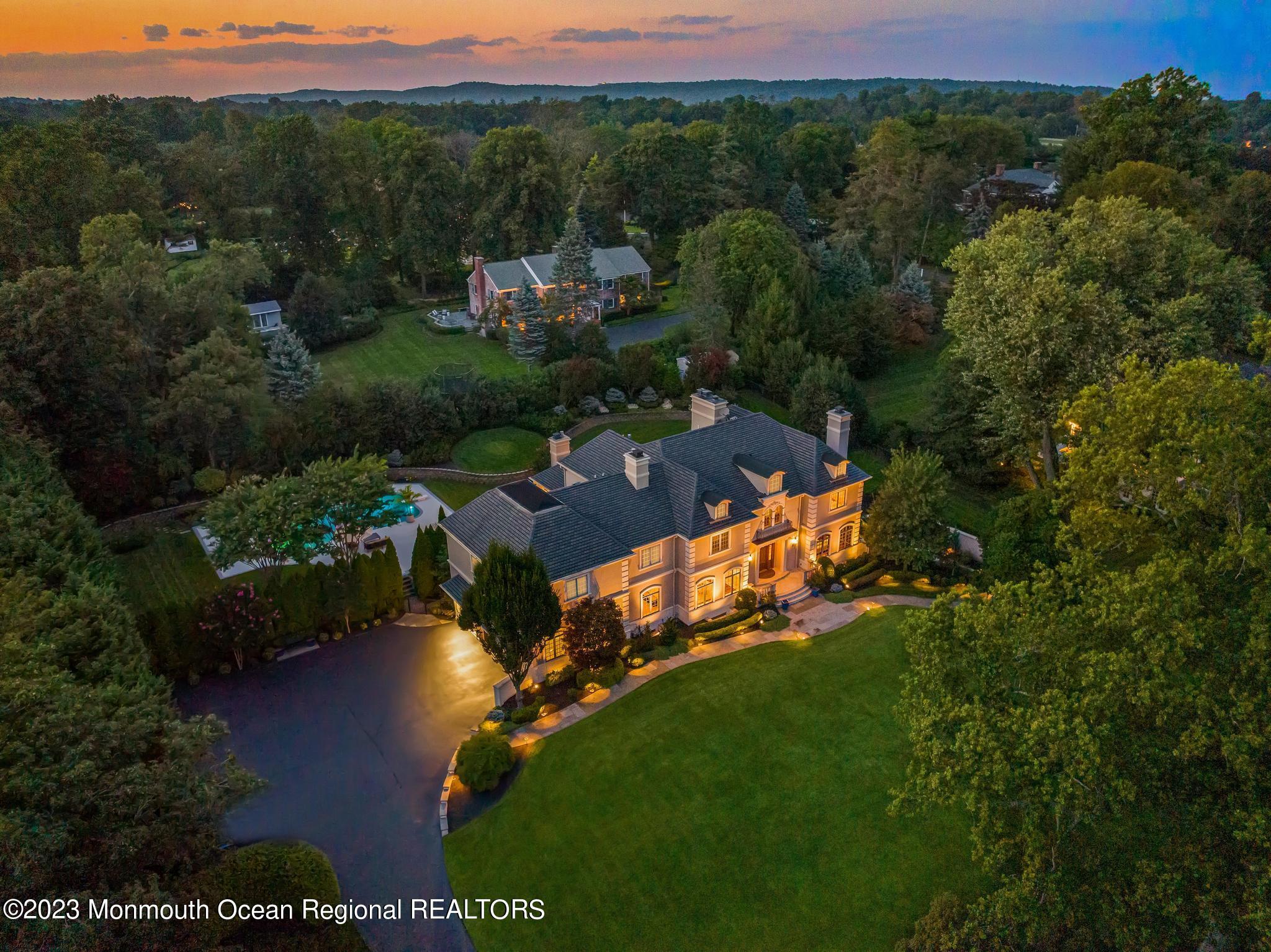 122 Rumson Road Rumson, NJ 07760 - Photo 100 of 100 an aerial view of a house with a garden