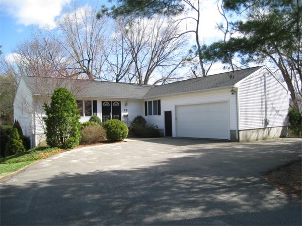 77 Bess Road Needham, MA 02492 - Photo 1 of 1 a front view of a house with a yard and potted plants
