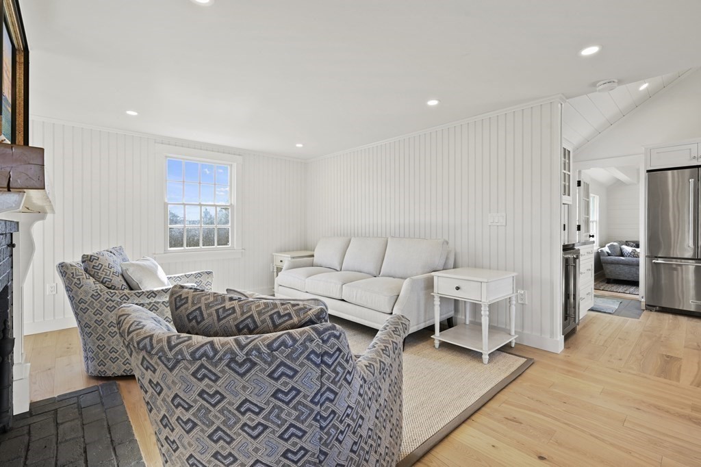 29 Mercier Way Edgartown, MA 02539 - Photo 11 of 29 a living room with furniture and a wooden floor