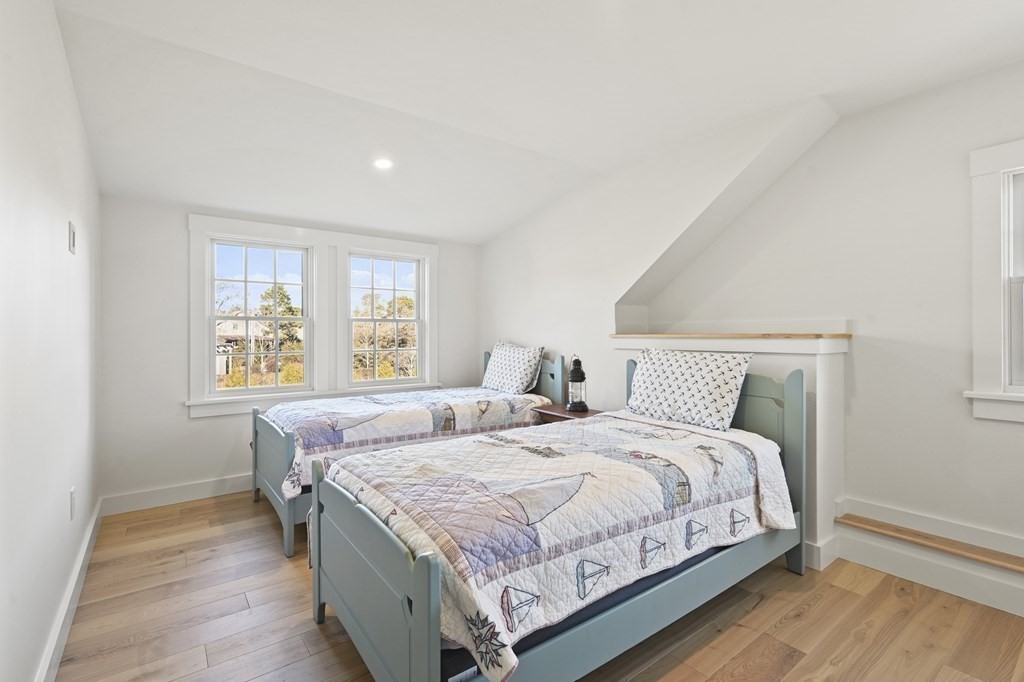 29 Mercier Way Edgartown, MA 02539 - Photo 19 of 29 a bedroom with a bed and a window
