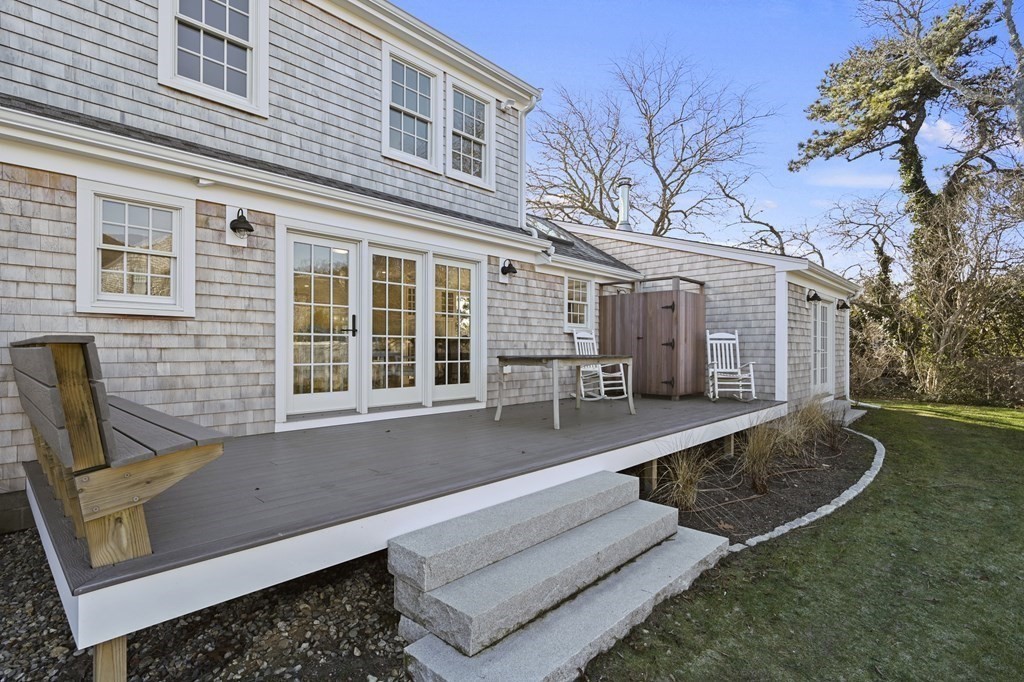 29 Mercier Way Edgartown, MA 02539 - Photo 24 of 29 a front view of a house with garden