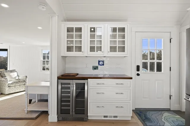 a kitchen with stainless steel appliances granite countertop a stove and cabinets