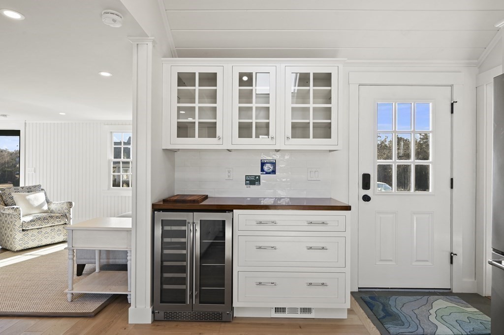 29 Mercier Way Edgartown, MA 02539 - Photo 9 of 29 a kitchen with stainless steel appliances granite countertop a stove and cabinets