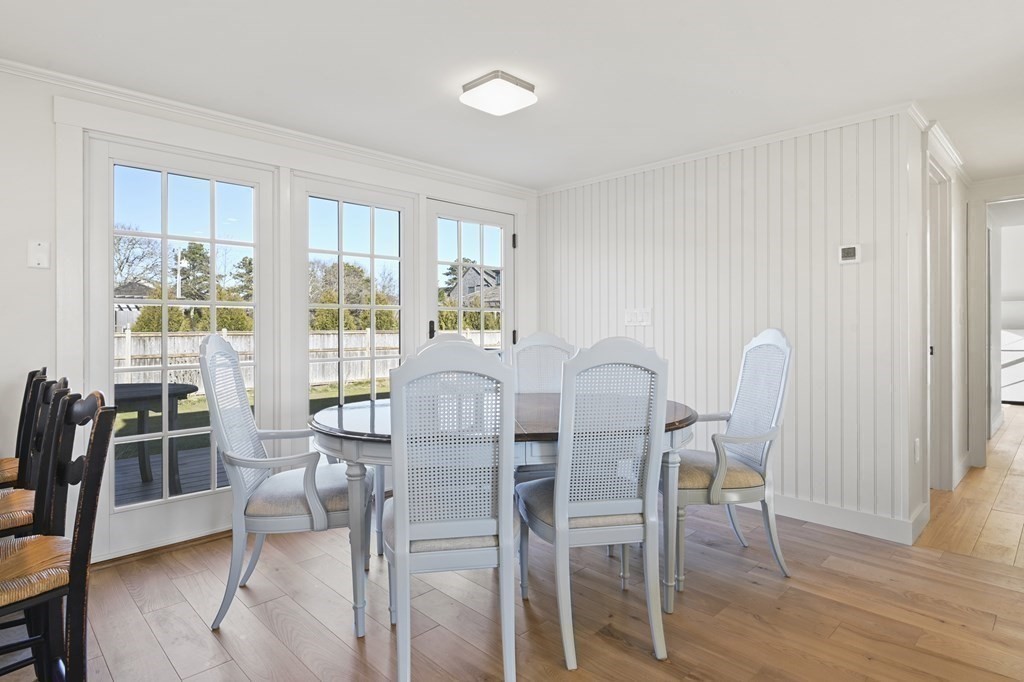 29 Mercier Way Edgartown, MA 02539 - Photo 10 of 29 a view of a dining room with furniture window and wooden floor