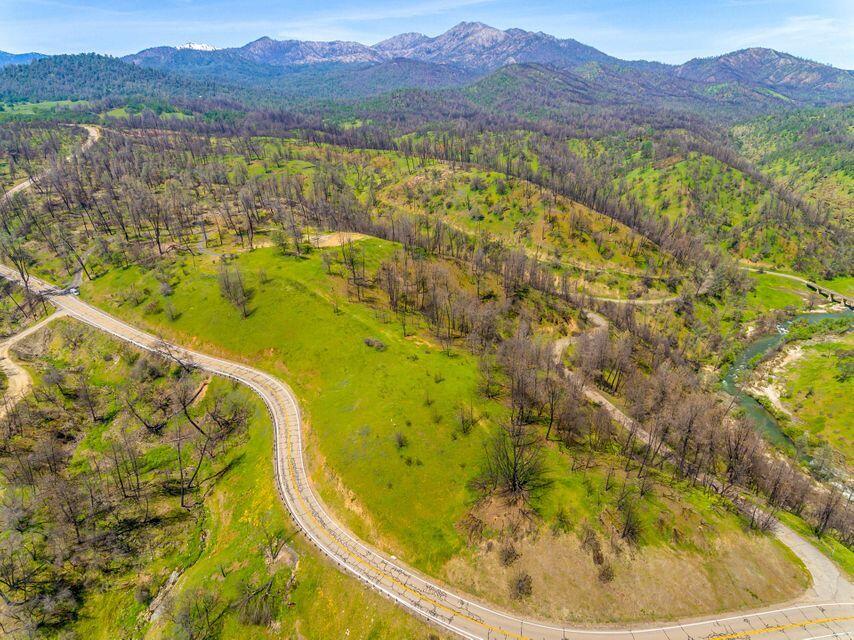 6950 Placer Road Igo, CA 96047 - Photo 9 of 25 a view of a swimming pool with a lake view