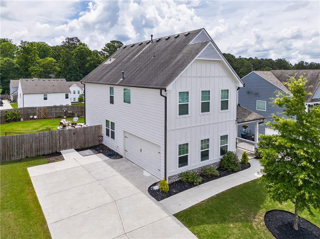 266 Shoals Bridge Road Acworth, GA 30102 - Photo 43 of 43 a view of a house with backyard and a garden