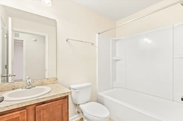 a view of a porch with a door and a window