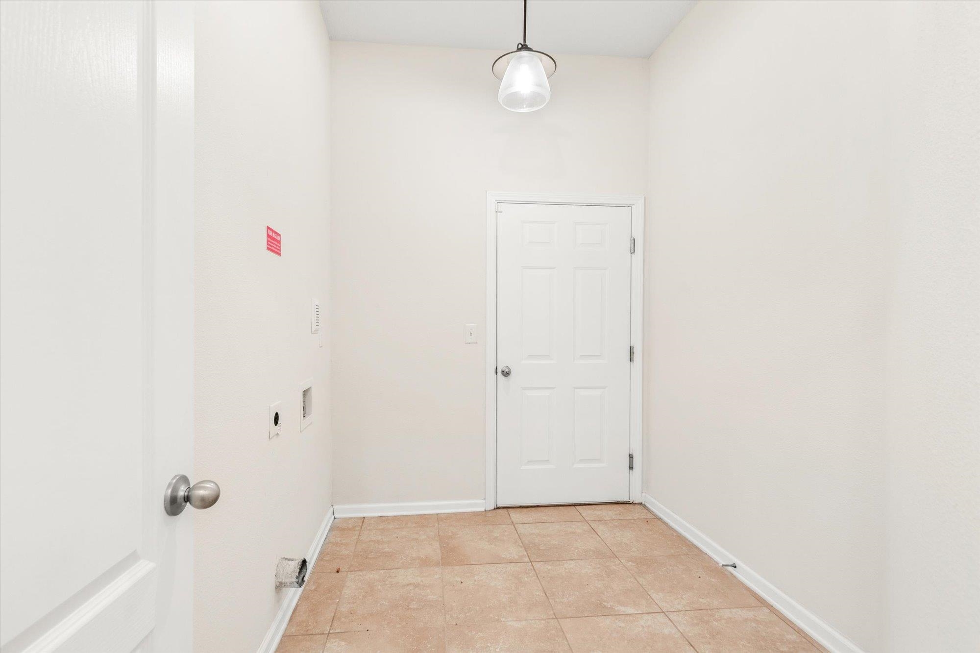 1511 Golden Lake Loop St. Augustine, FL 32084 - Photo 18 of 30 a view of a room with rack on the wall