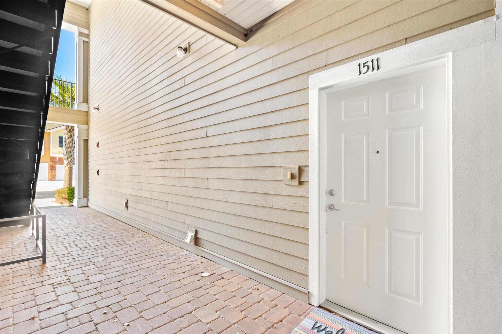 1511 Golden Lake Loop St. Augustine, FL 32084 - Photo 19 of 30 a view of a porch with a door and a window