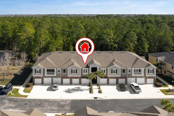 a view of staircase with white walls