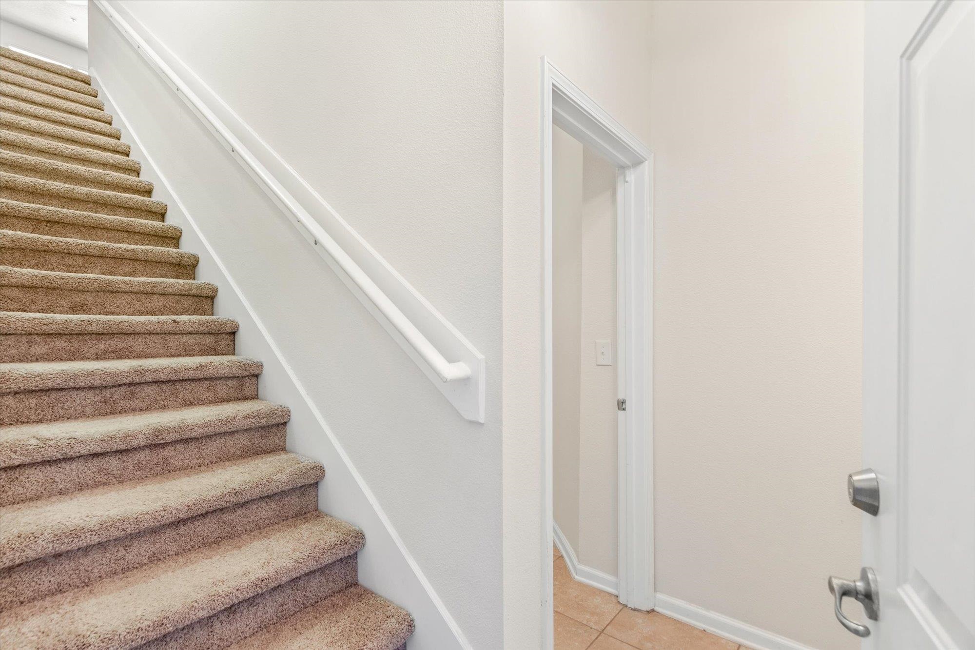 1511 Golden Lake Loop St. Augustine, FL 32084 - Photo 3 of 30 a view of staircase with white walls